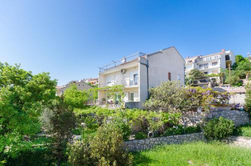 Фотография гостевого дома Apartments and Room Drazen