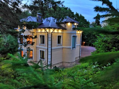 Фотография гостевого дома Коттедж в городе