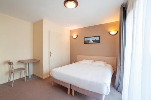 Фотография апарт отеля Zenitude Hôtel-Résidences Magny-les-Hameaux