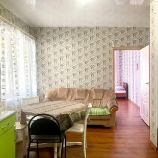 Фотография квартиры Апартаменты С кухней гостиной и отдельной спальней