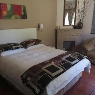 Фотографии гостевого дома 
            Thatchers Guest Rooms