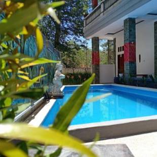 Фотографии мини отеля
The Puncak Santhi Inn