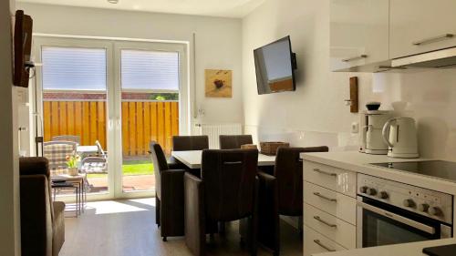 Фотография гостевого дома Mittelpunkt 9 - Zentrales Reihenhaus in perfekter Lage