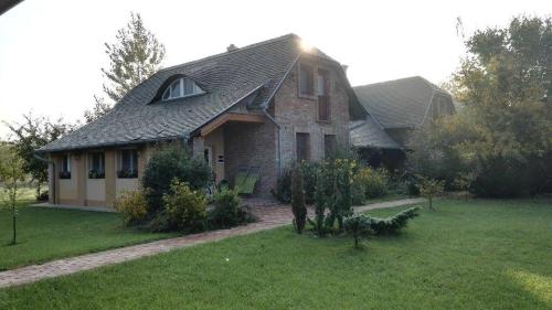 Фотография гостевого дома Dinnyelaposi Vendégház