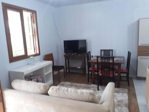 Фотография гостевого дома Hospedagem aconchegante na Serra