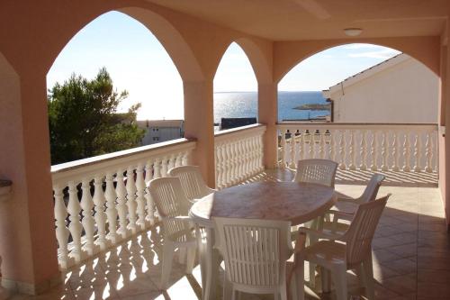 Фотография гостевого дома Apartments with a parking space Povljana, Pag - 6296