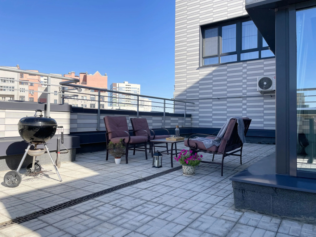 Фотография квартиры Квартира Стильная квартира с террасой в центре города