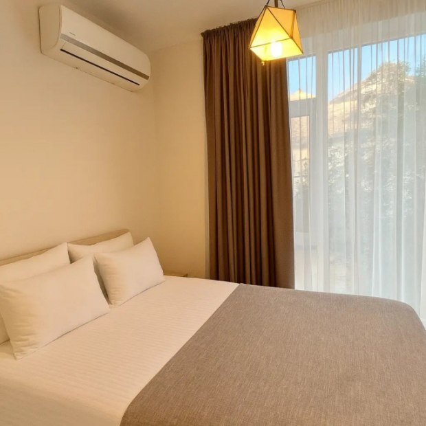 Фотографии квартиры 
            Апартаменты Двухкомнатные с Балконом в Cамом Сердце Адлера