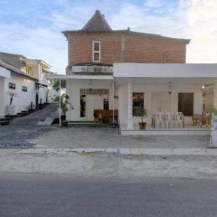 Фотографии гостиницы 
            OYO 1533 The Paris Ocean