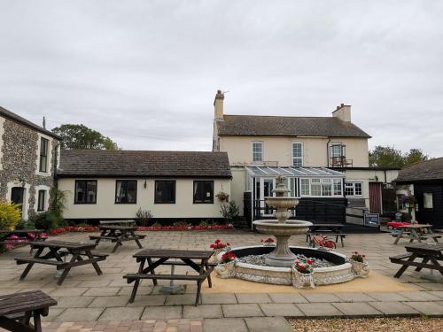 Фотографии гостиницы 
            Coach house hotel