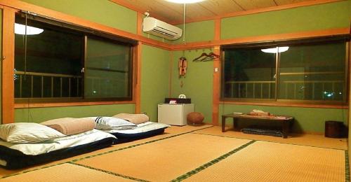 Фотографии гостиницы 
            Private Twin Room - Aoshima Guesthouse Hooju - Vacation STAY 6392