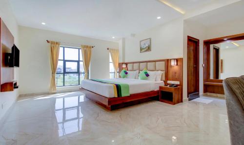 Фотография гостиницы Treebo Trend The Meridian Stadium Road