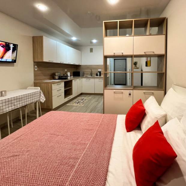 Фотографии квартиры 
            Апартаменты Vgosti 33 Фейгина 22 - 13 этаж