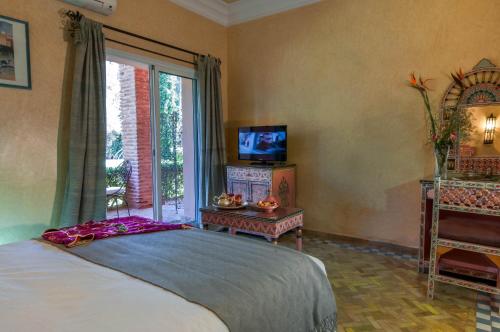 Фотография гостевого дома Room in BB - Double room in a charming villa in the heart of Marrakech palm grove