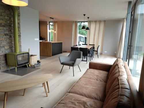 Фотография гостевого дома Ardennature vakantiehuizen met privé-sauna