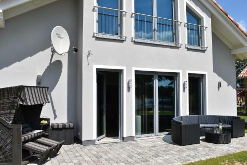 Фотография гостевого дома Luxus-See-Domizil mit Sauna, Kamin und Boot-130 qm für 6 Personen