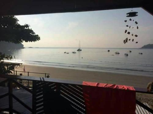 Фотография гостевого дома Juara Ocean Chalet