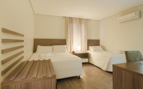 Фотография гостиницы Umbu Hotel Porto Alegre - Centro Histórico - Prox Aeroporto 15min