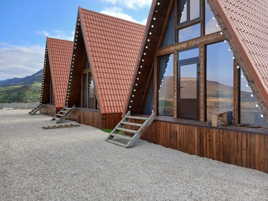 Фотография Коттеджа Частный дом Тишина в горах с видом на город и море и с прекрасным лесным пейзажем