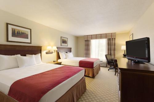Фотография гостиницы Country Inn & Suites by Radisson, Nevada, MO