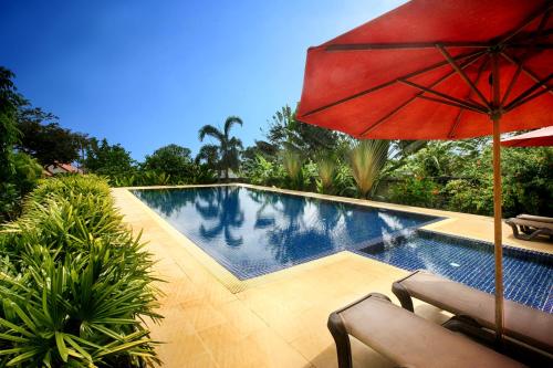 Фотография гостевого дома Q Bungalows