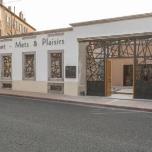 Фотографии гостиницы 
            Hôtel Mets et Plaisirs