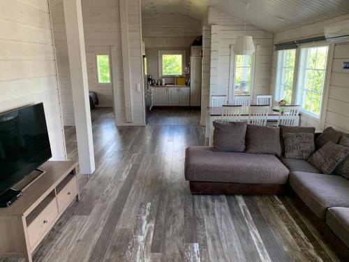 Фотографии гостевого дома 
            VITA Ruokolahti 2-bedroom cottage