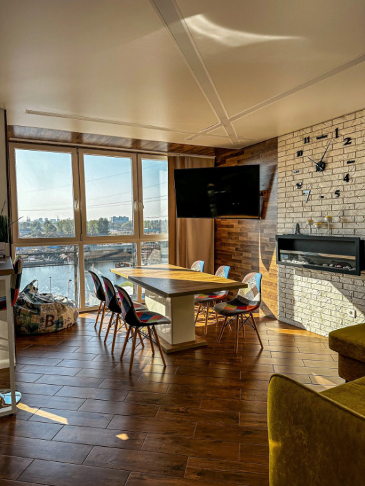 Фотографии квартиры 
            Апартаменты GEOMETRY - Просторная квартира с панорамным видом на реку в центре