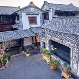 Фотографии мини отеля 
            Shaxi Aoding Courtyard