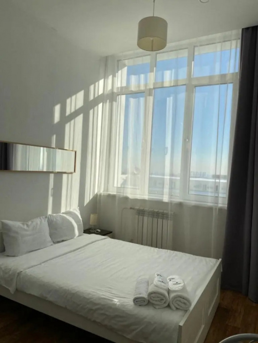 Фотографии квартиры 
            Апартаменты KrasLoft в Парк-Сити на двоих