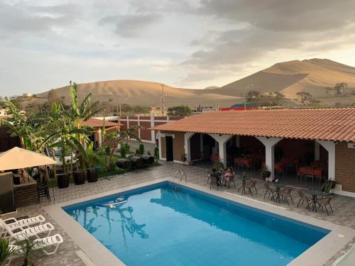 Фотографии гостиницы 
            Huacachina Desert House