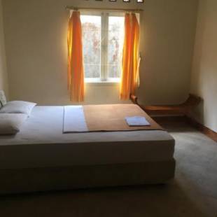 Фотографии гостиницы 
            Hotel Kayu Manis