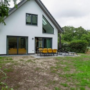 Фотография гостевого дома Modern Holiday Home in Texel with Garden
