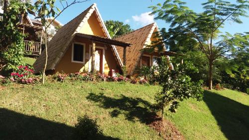 Фотография гостевого дома Chalés Praia de Minas