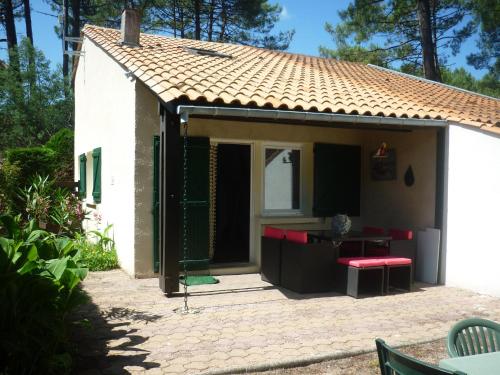 Фотография гостевого дома Tres agreable maison au calme dans la pinede