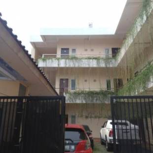 Фотографии гостиницы 
            OYO 1078 Fakhira Residence