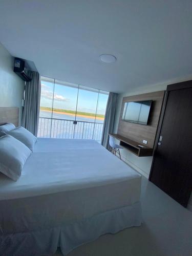 Фотография гостиницы Hotel Orla do Rio Branco