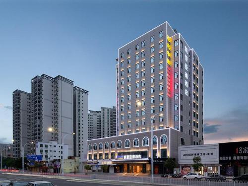 Фотографии гостиницы 
            Kyriad Marvelous Hotel Maoming Wanda Plaza