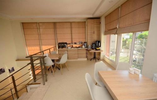 Фотография мини отеля Your twin room is only 900m from the Batumi beachfront