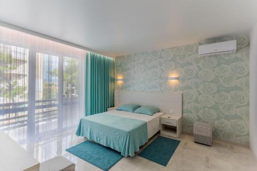 Фотографии гостевого дома 
            Южная Роза