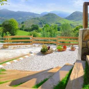 Фотографии гостевого дома 
            4 bedrooms house with furnished garden and wifi at Picos de Europa