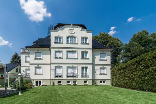 Фотография гостевого дома Hotel Villa am Waldschlösschen