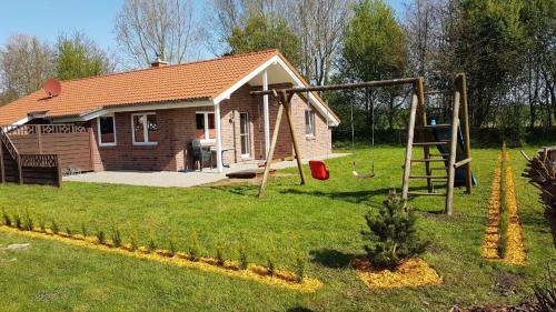 Фотография гостевого дома Ferienhaus Strandmuschel