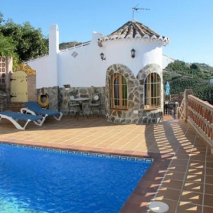 Фотография гостевого дома Holiday Home Tres Palmeras - FRG131