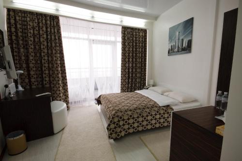 Фотографии гостиницы 
            SkyTech в Мост Сити