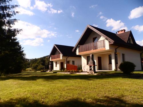 Фотография гостевого дома Bulwary Mszańskie Domki Całoroczne