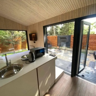 Фотография Коттеджа Ультрасовременный домик для отдыха вдвоем