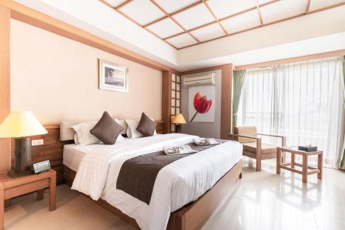 Фотография апарт отеля Green Residence Ayutthaya - SHA Certified