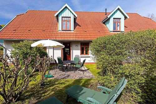 Фотография гостевого дома Ferienhaussiedlung Strandperlen Buchenhof 4b (Typ V)