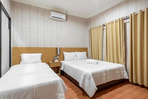 Фотография гостиницы RedDoorz Syariah near RSUD Zainoel Abidin Banda Aceh